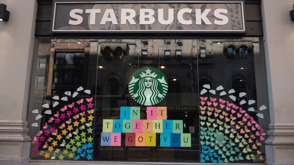 Starbucks store with a rainbow in the windows