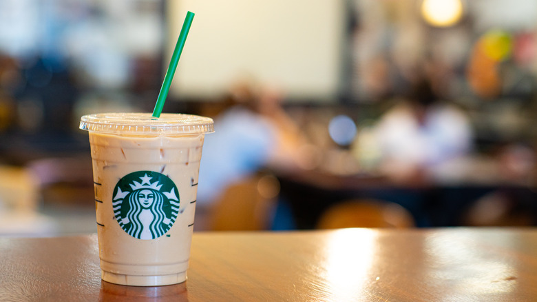 iced starbucks drink on table