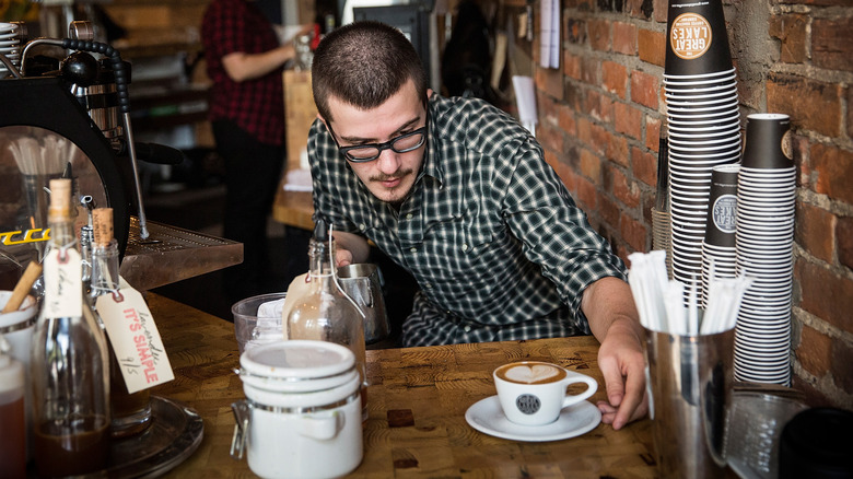 Barista working at Great Lakes Coffee Company in Detroit, Michigan
