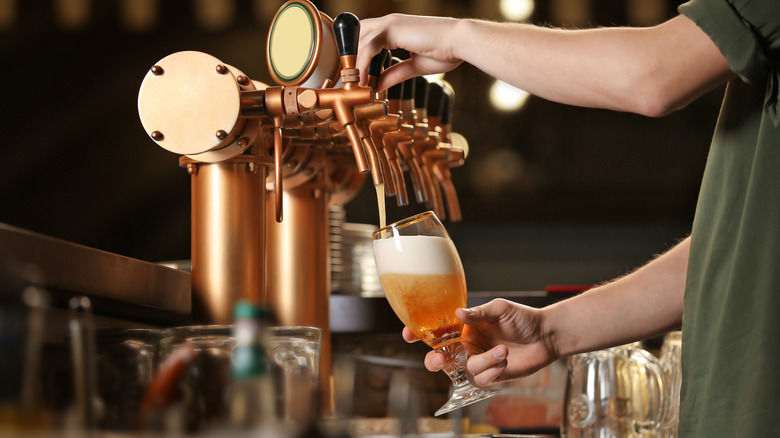 Beer being poured into a glass