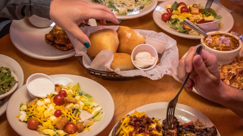 assorted dishes on table at Texas roadhouse restaurant