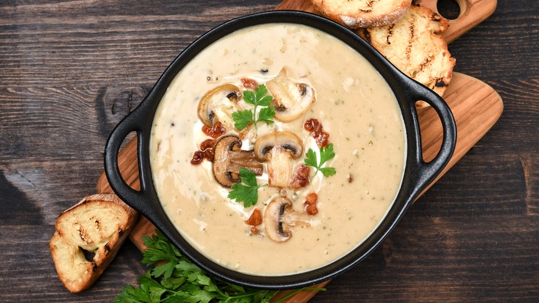 Mushroom soup with bread.