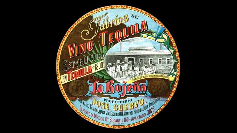 A colorful vintage label advertises "Vino Tequila" in red letters at the top and "Jose Cuervo" in yellow at the bottom.