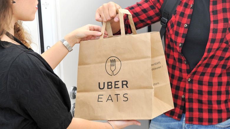Uber eats being delivered to a customer