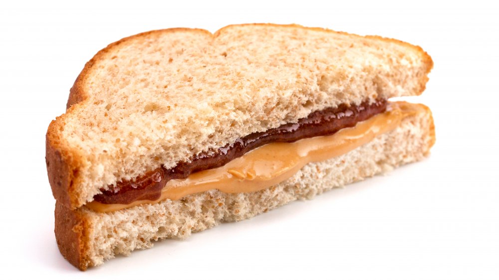 Peanut butter and jelly sandwich cut in half