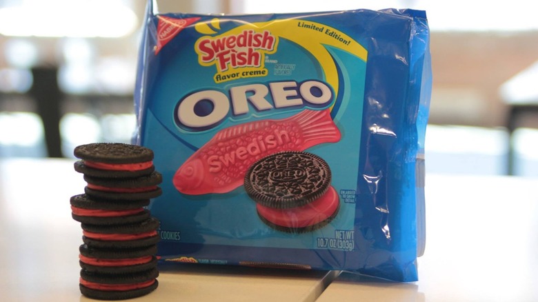package of Swedish Fish Oreos next to stack of cookies