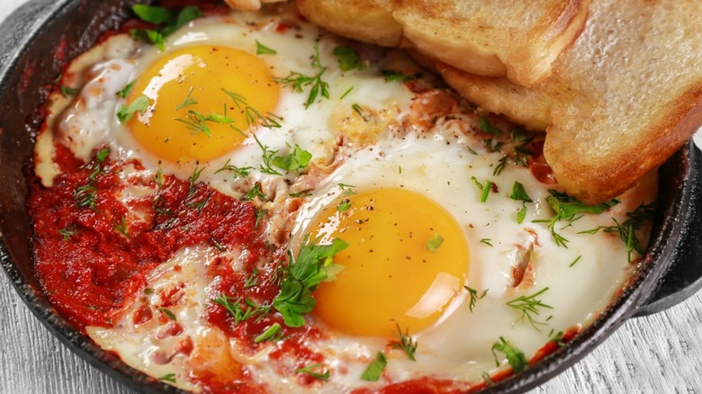 poached skillet eggs in tomato sauce