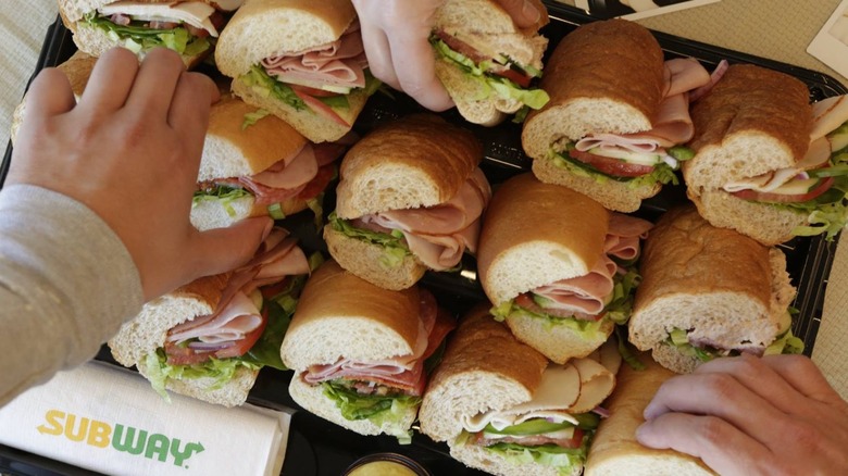 Tray of Subway sandwiches