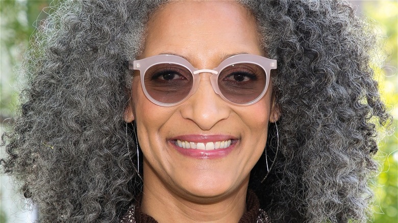 Smiling Carla Hall wearing sunglasses