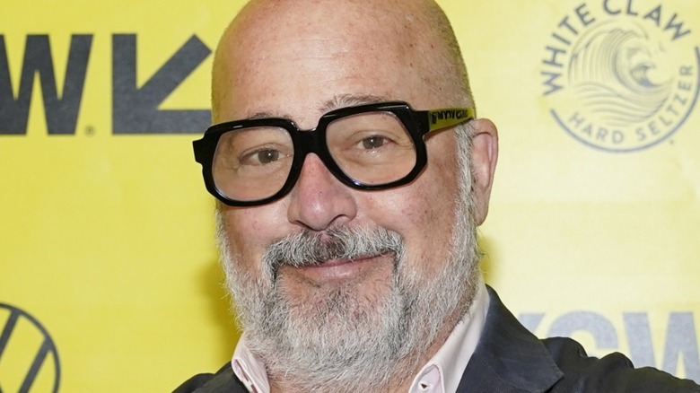 Andrew Zimmern wearing glasses