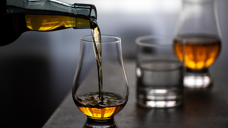 Whisky being poured in a glass