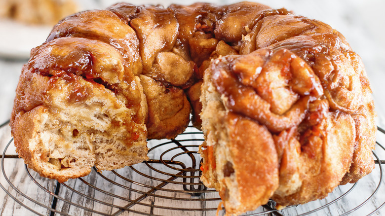 Sliced monkey bread on metal rack