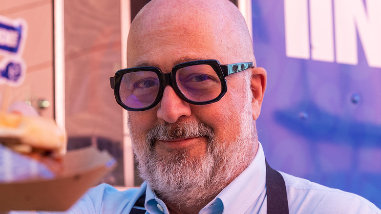 Andrew Zimmern smiling