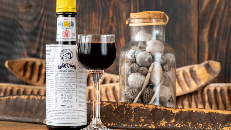 Angostura bitters in bottle and glass