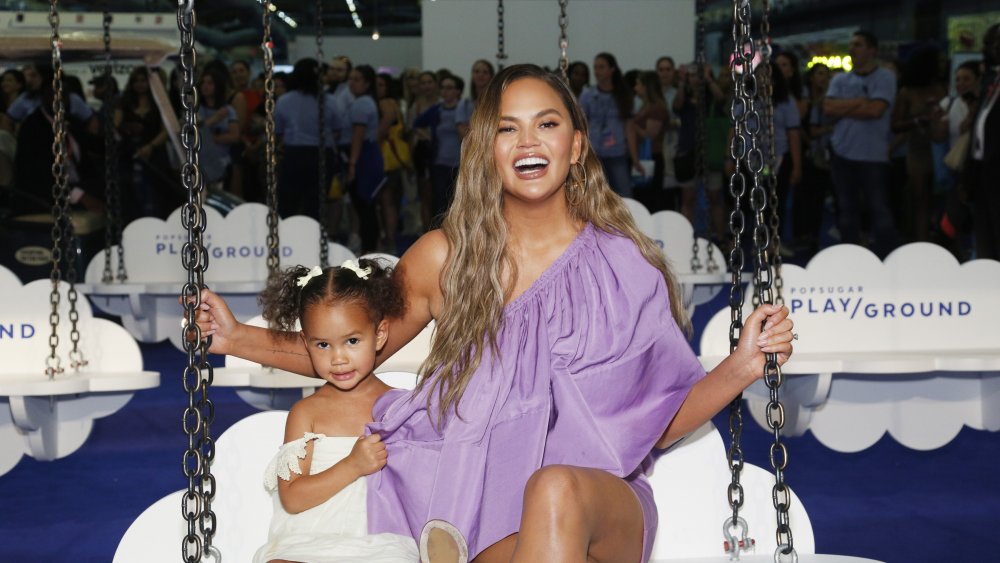 Chrissy Teigen and Luna