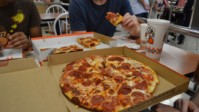 People eating at Little Caesars