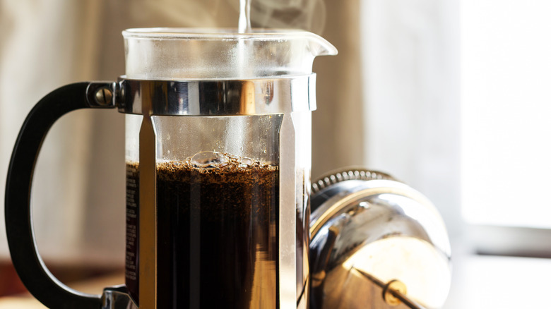 Water being poured into French press