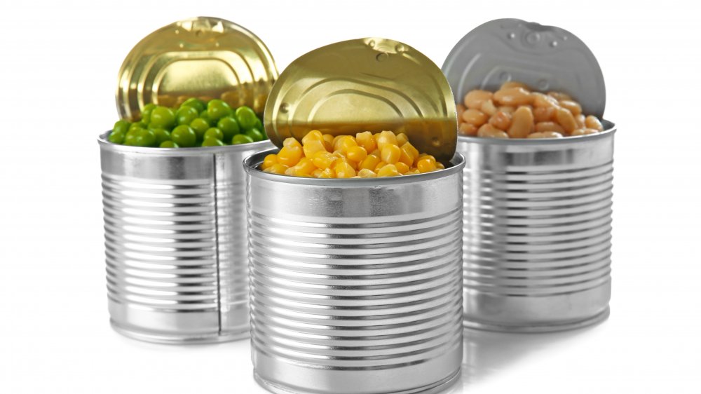 three cans of vegetables