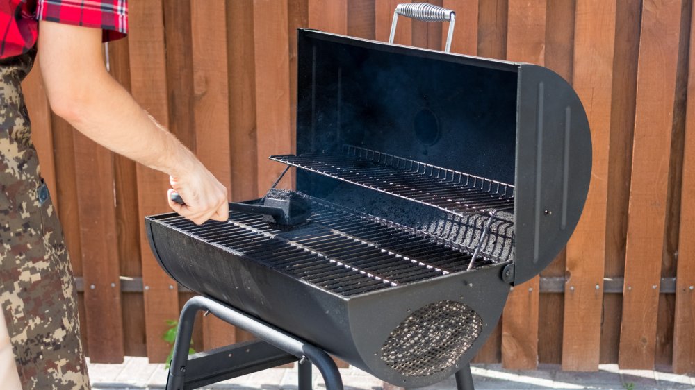 Grill being cleaned