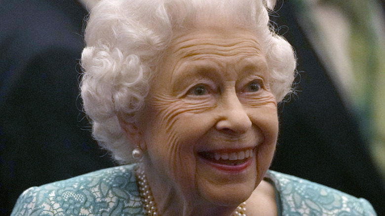 Queen Elizabeth in ice blue suit