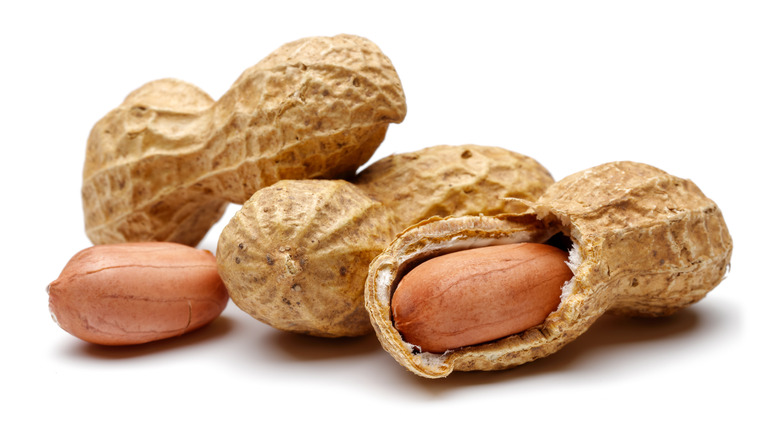 Peanuts against white background