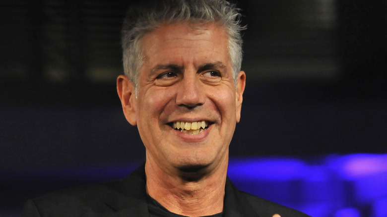 Anthony Bourdain wearing black shirt