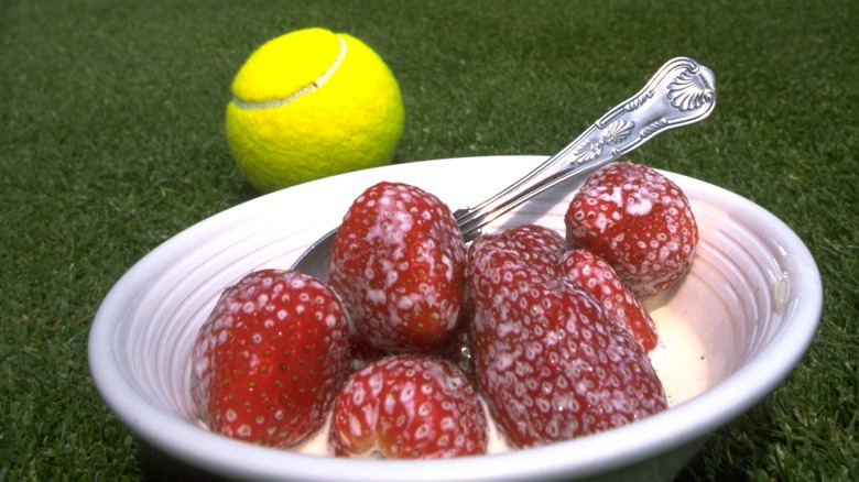 strawberries and cream with tennis ball