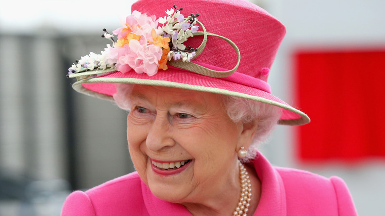 Queen Elizabeth in Pink with wide smile