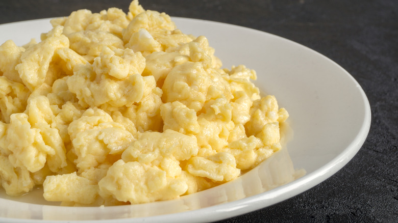 scrambled eggs on white plate