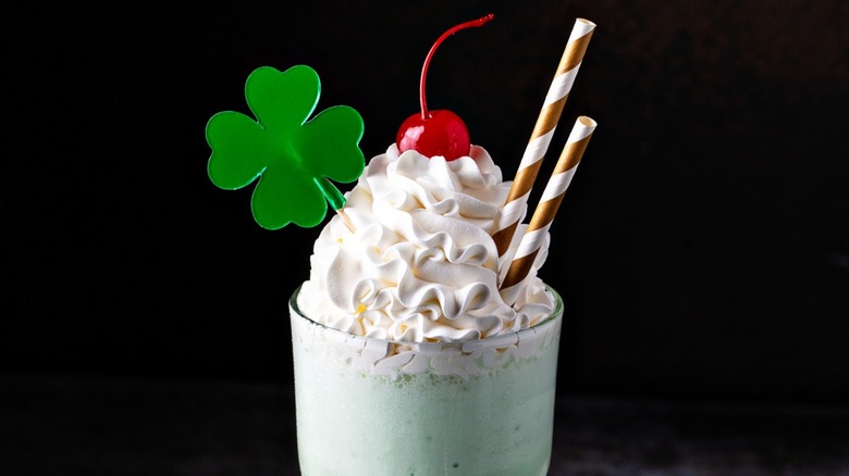 green milkshake with shamrock decoration