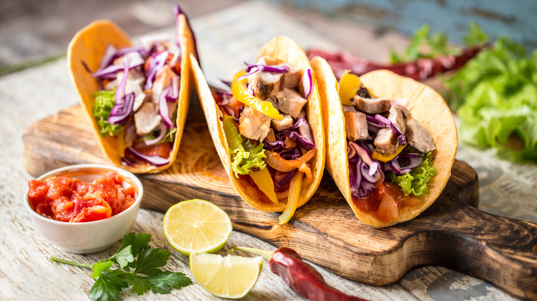 Tacos on wooden board