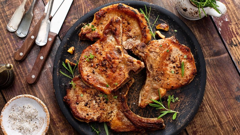 Grilled pork chops on plate