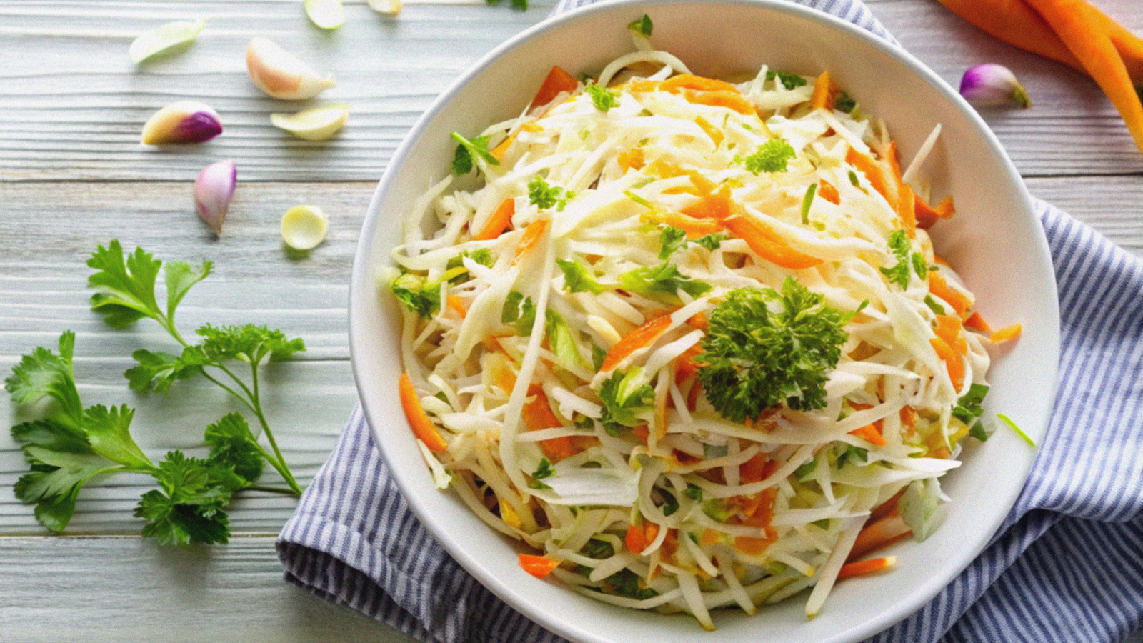 The Tangy Ingredient That Absolutely Belongs In Coleslaw