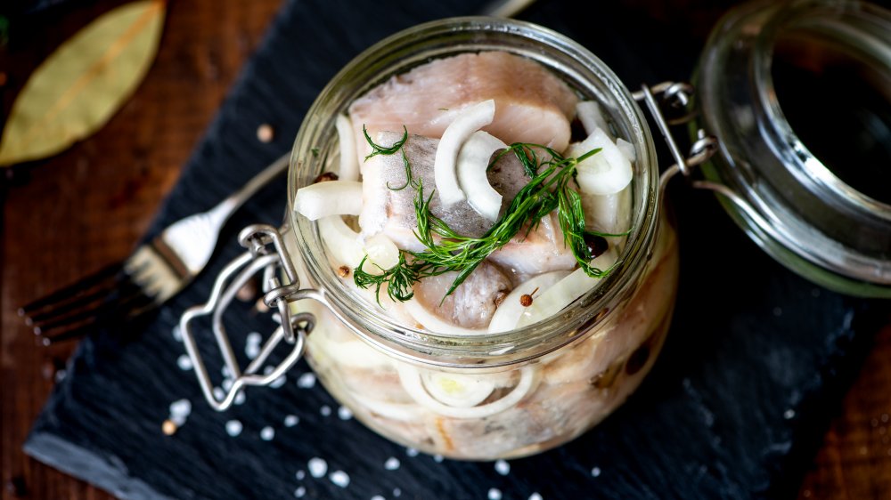 Jar of pickled herring in spices