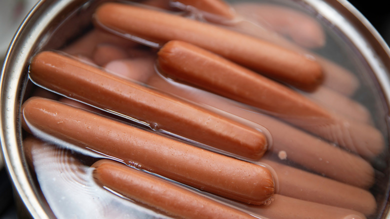 Hot dog wieners in pot