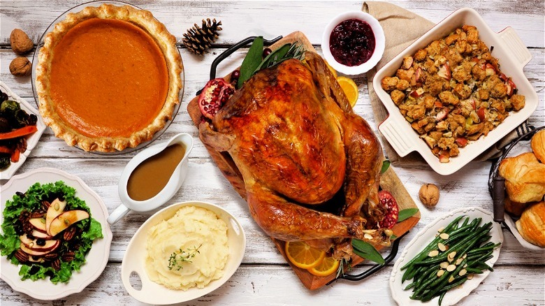 Thanksgiving dinner with turkey centerpiece