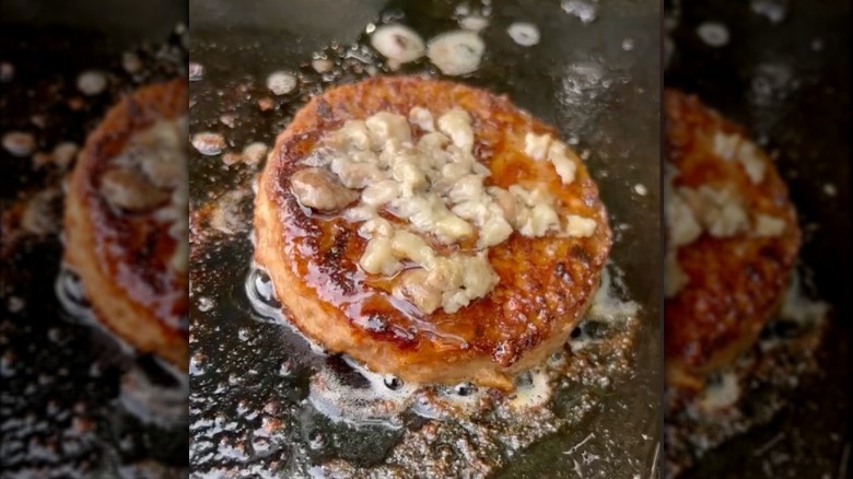 TheVeganTeacher adding bone barrow to vegan patty