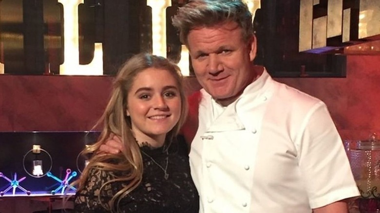 Matilda Ramsay in black dress with dad Gordon Ramsay