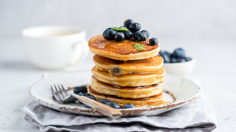 Pancakes with blueberries and honey