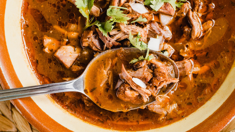 Birria stew with a spoon