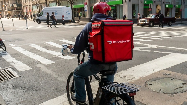 DoorDash driver on a bicycle