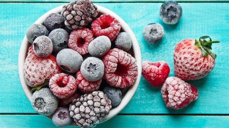 bowl of frozen raspberries, blackberries, blueberries, and strawberries