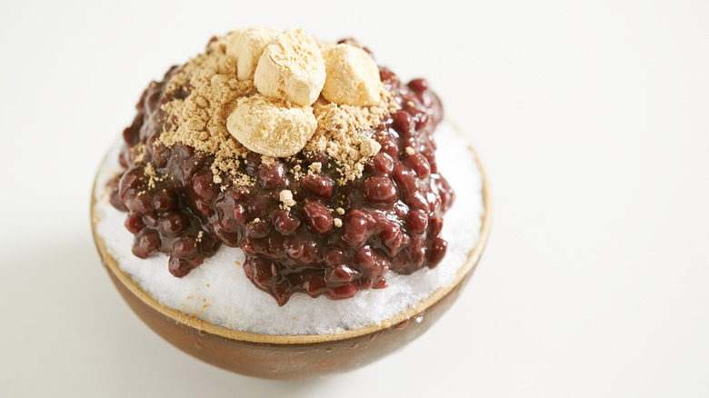 bingsu topped with red beans and sesame