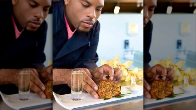 Judson Todd Allen plates a dish