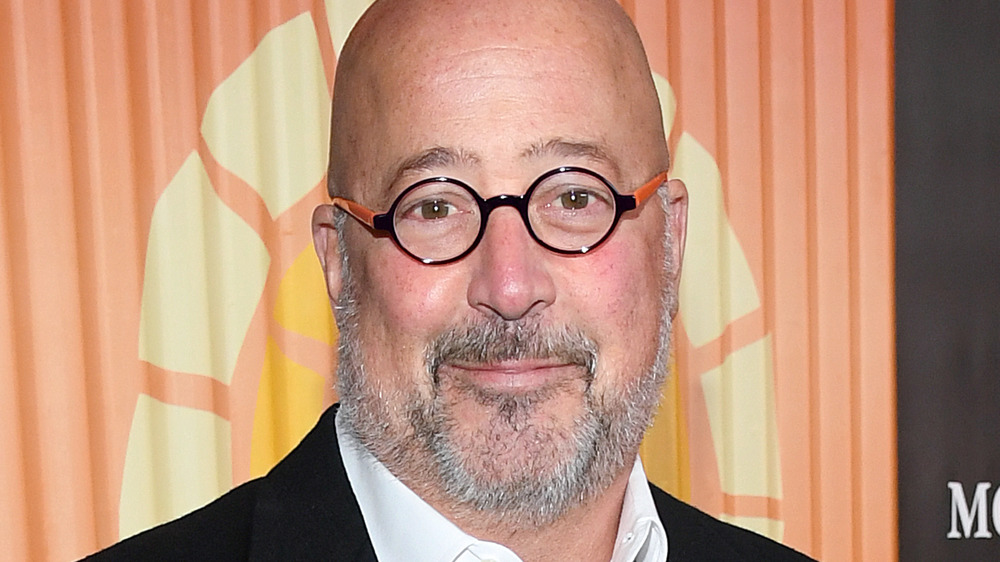 Andrew Zimmern smiling at event