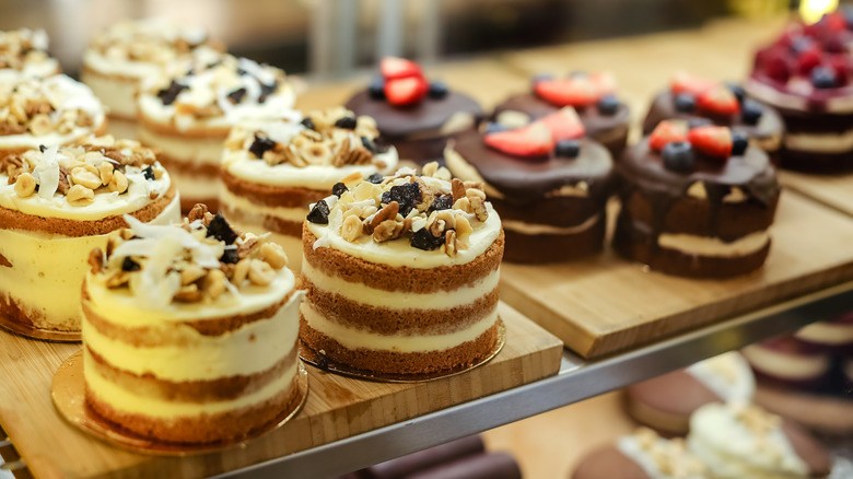 assorted desserts in glass case