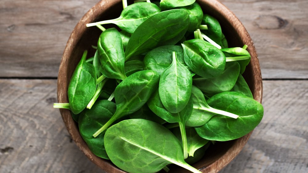Bowl of spinach on the table 