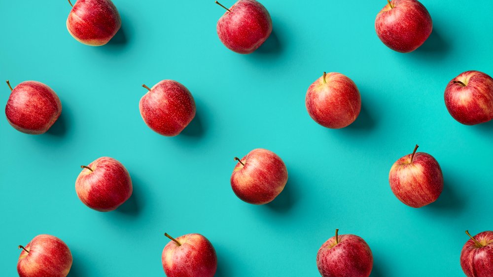 apples against a blue background