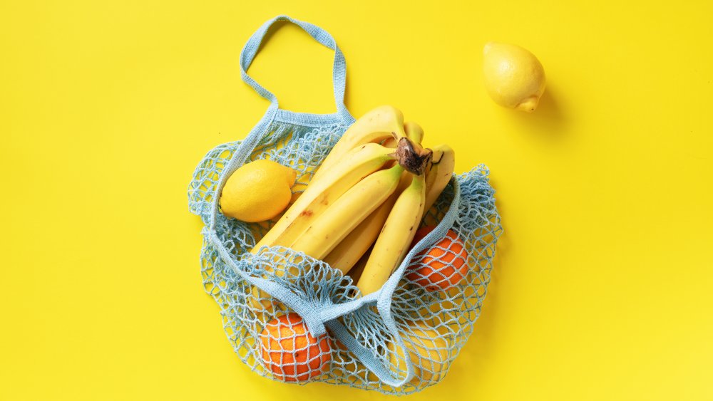 bunch of bananas in a reusable bag