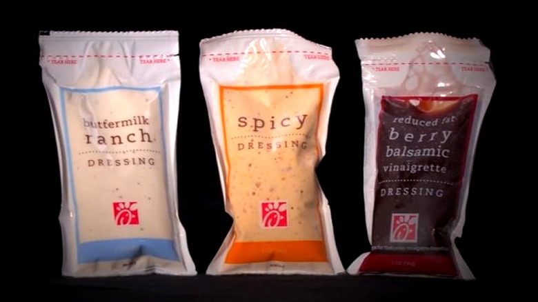 Chick-fil-A's Buttermilk Ranch, Spicy, and Berry Balsamic Vinaigrette salad dressings.